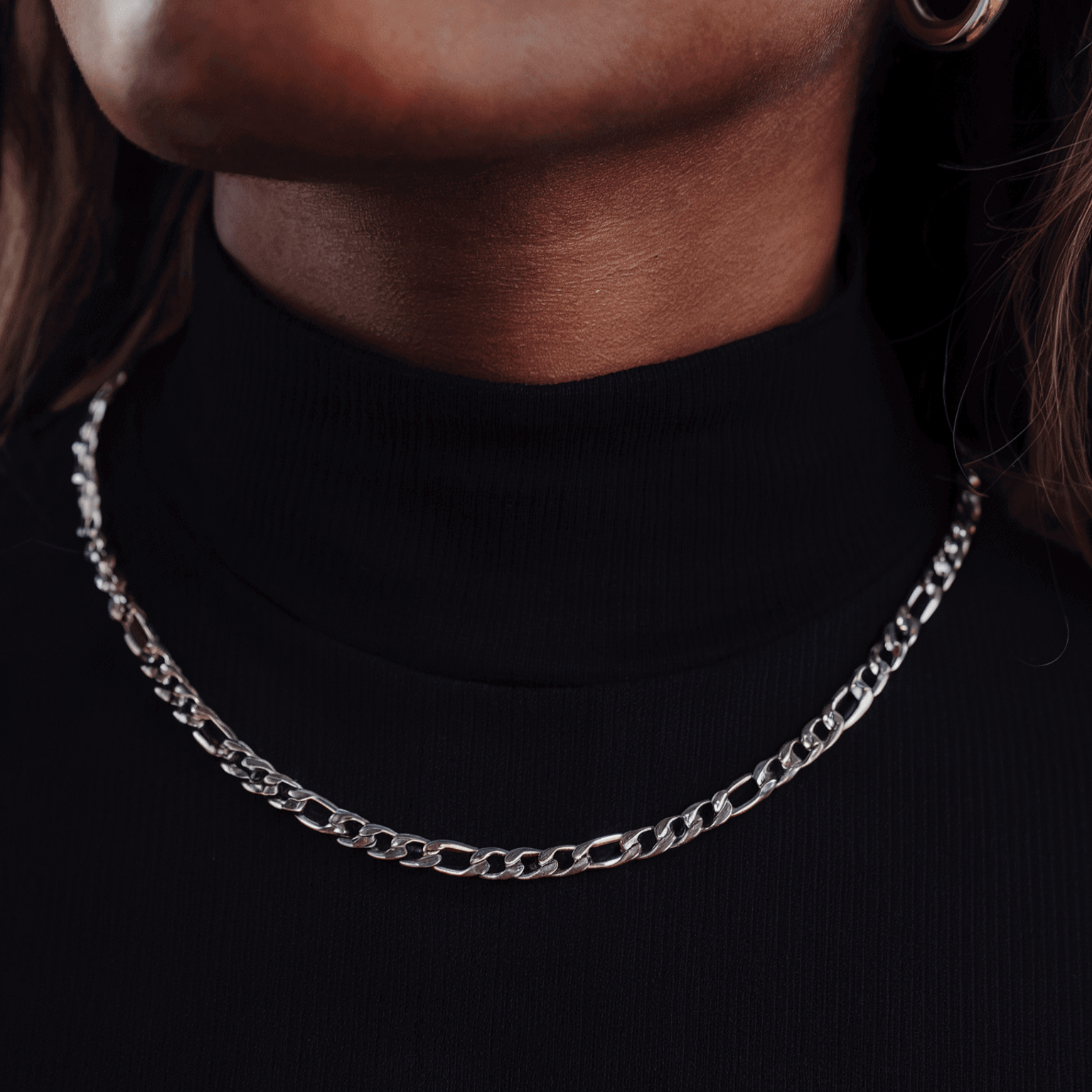 Figaro schakelketting in zilver, elegant en stijlvol, perfect voor elke gelegenheid.