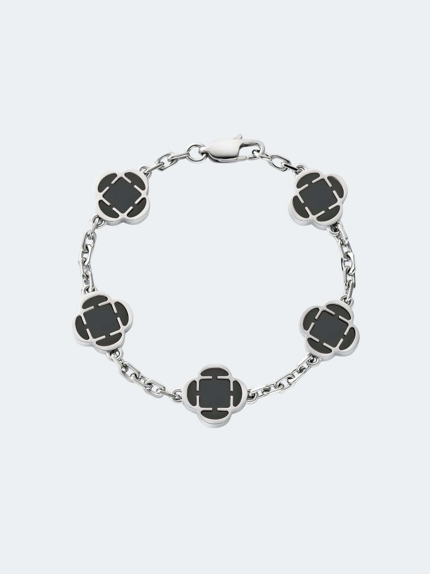Zilveren Klaver Armband Zwart met onyx stenen en zilveren schakels, perfect voor stijl en spiritualiteit.