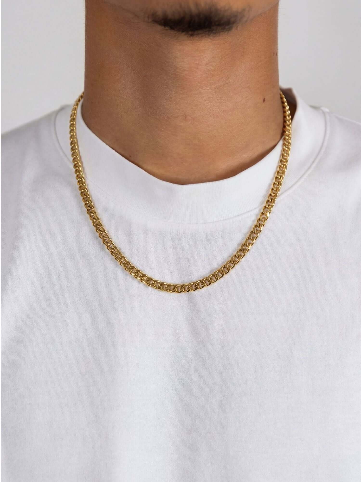 Cuban chain 18K gold-plated (5mm) worn around the neck, 5mm Cuban link chain with a luxurious gold finish