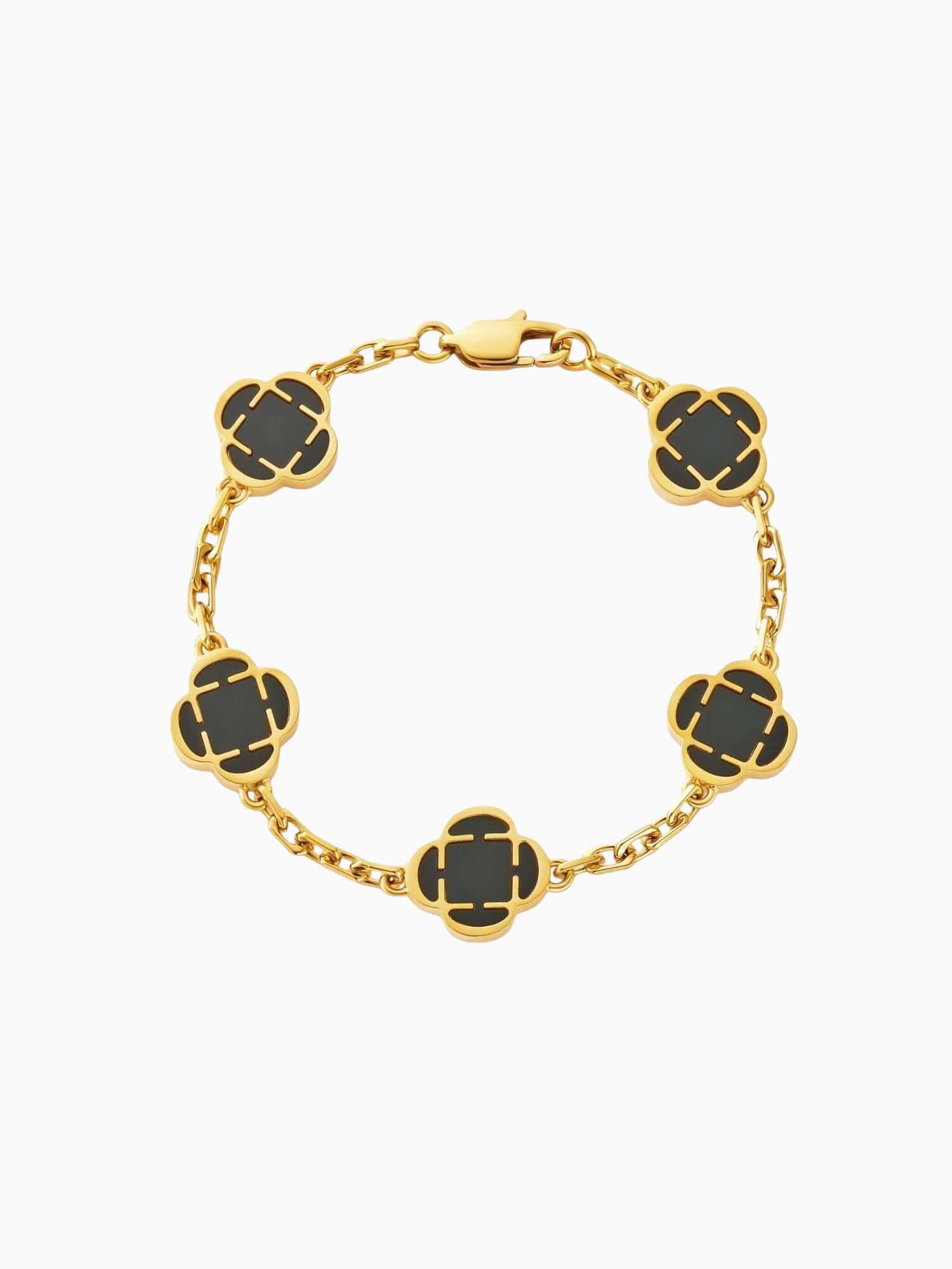 Bracciale Klaver in oro con pietra di onice nera, maglie con quadrifoglio, accenti in acciaio inox color oro e onice nera