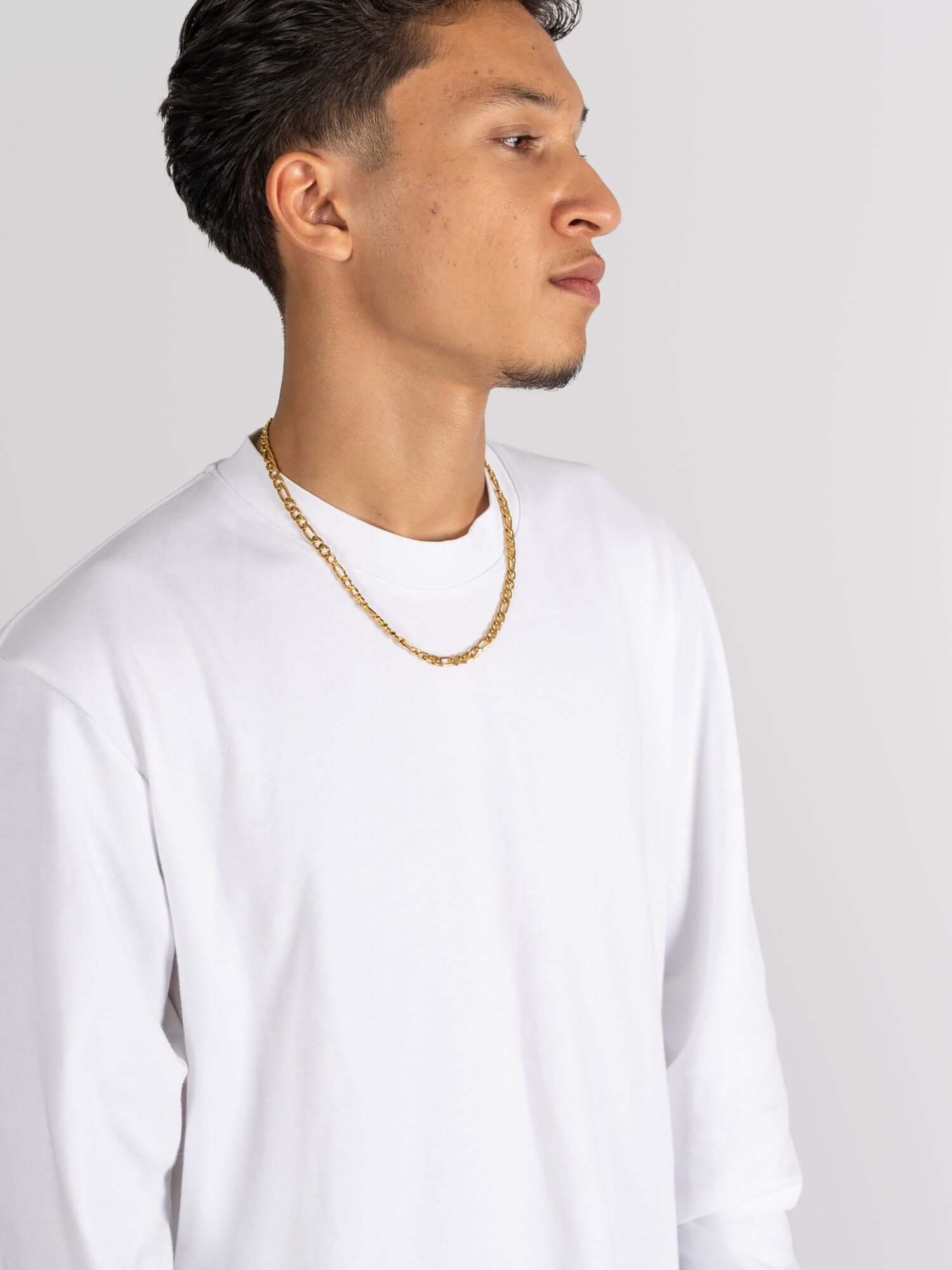 Figaro Necklace Gold Stainless Steel (3mm & 6mm) gold-colored stainless steel chain worn by model, classic Figaro link pattern