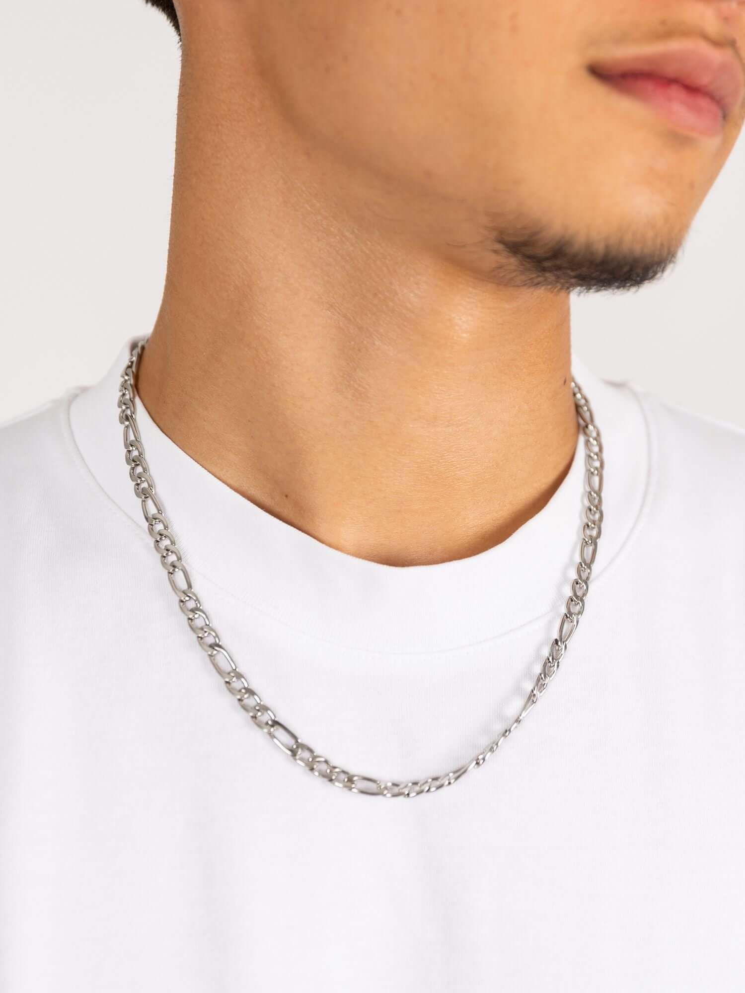 Figaro Necklace Silver Stainless Steel (3mm & 6mm) worn around the neck, silver-colored stainless steel Figaro link chain with a classic design