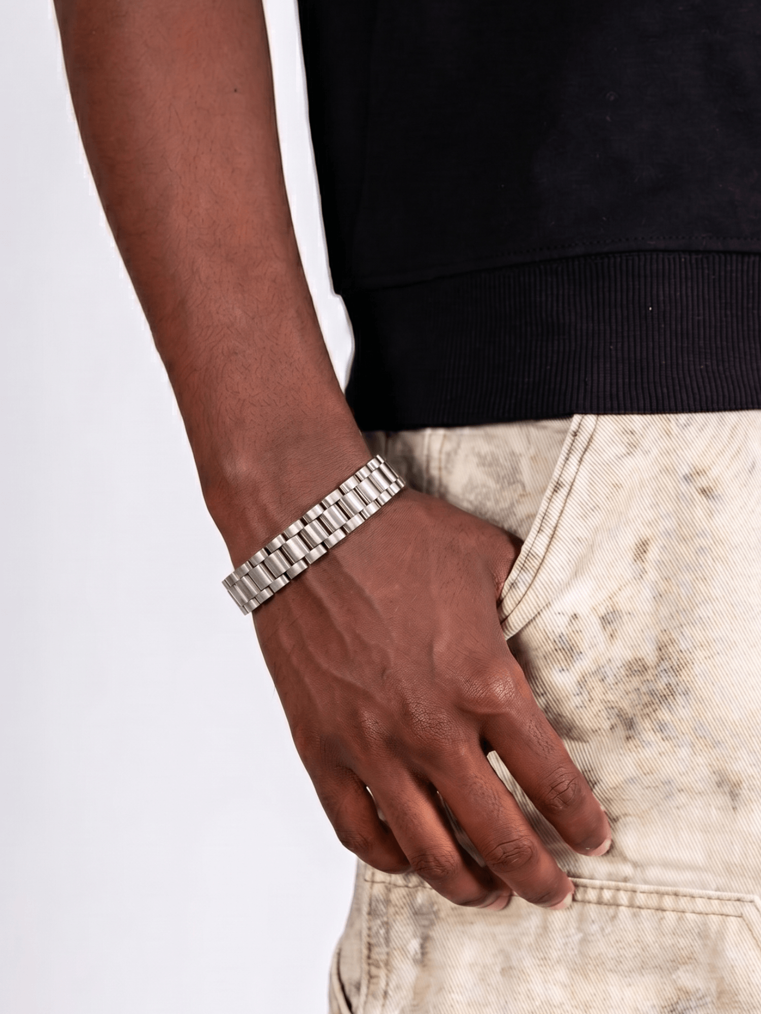Rolex Armband Zilver RVS (10mm) op de hand, luxe schakelarmband met iconisch design, stijlvolle uitstraling.