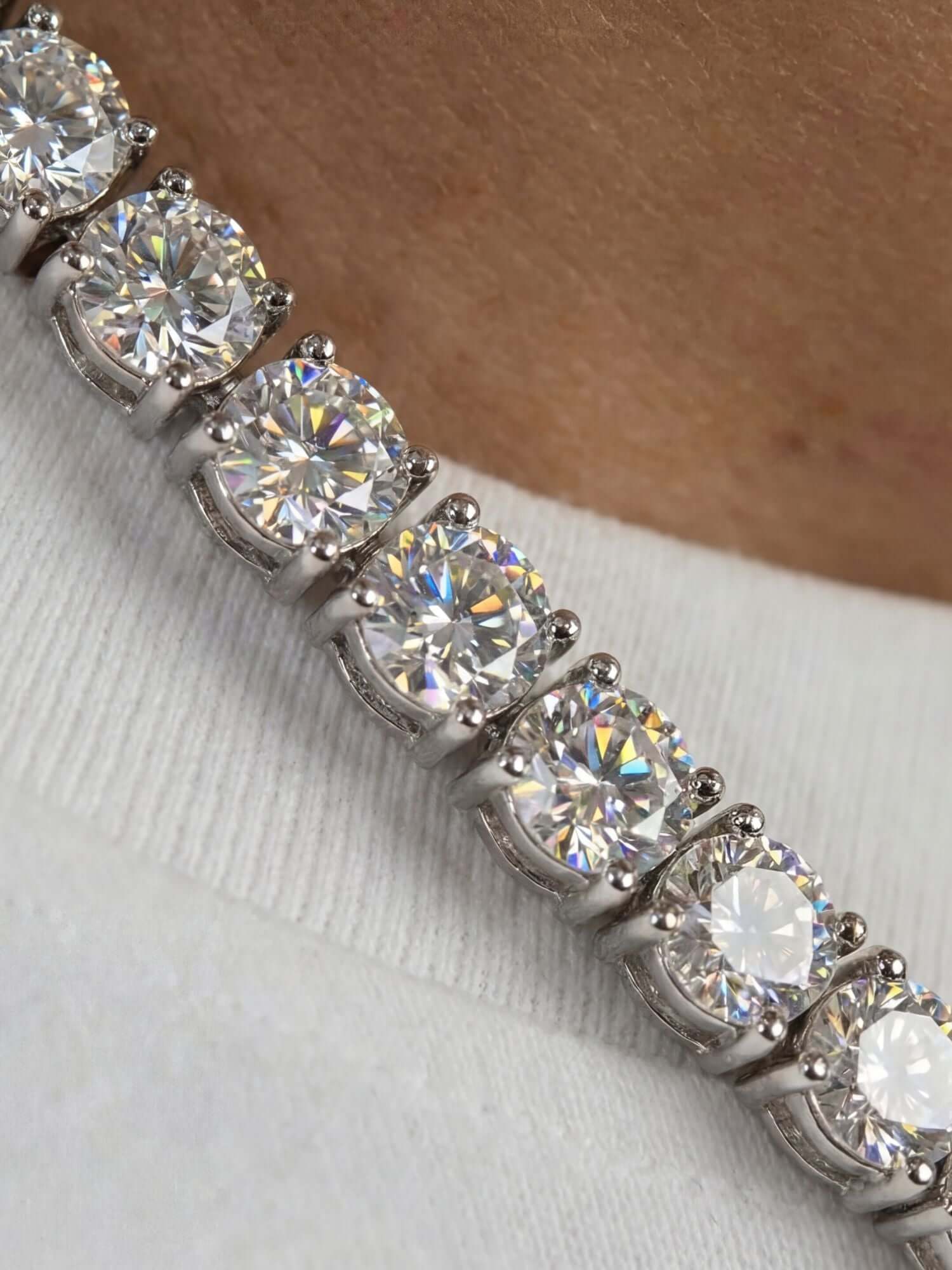 silver tennis chain (3mm & 5mm) close-up with VVS CZ stones in a silver setting, luxury tennis necklace around the neck