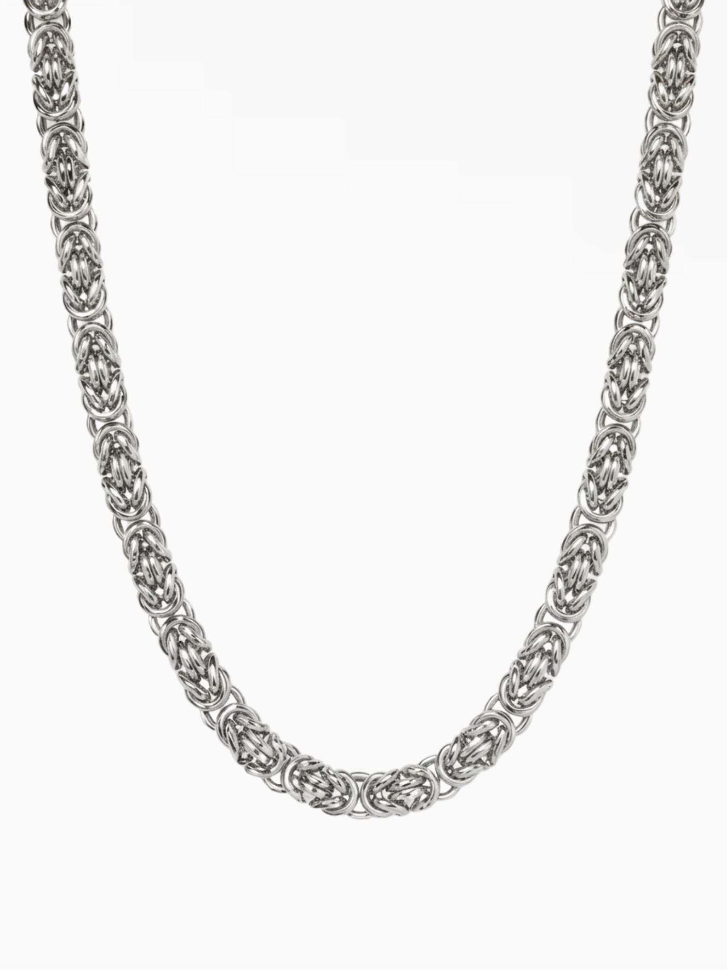 Zilveren Byzantijnse Konings Ketting RVS 6mm van Carpe Ice op lichte studioachtergrond, met het volle byzantijnse schakelpatroon